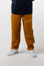 Load image into Gallery viewer, CHAINSTITCH SCRIPT NYLON PANT - BURNT GOLD