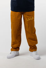 Load image into Gallery viewer, CHAINSTITCH SCRIPT NYLON PANT - BURNT GOLD